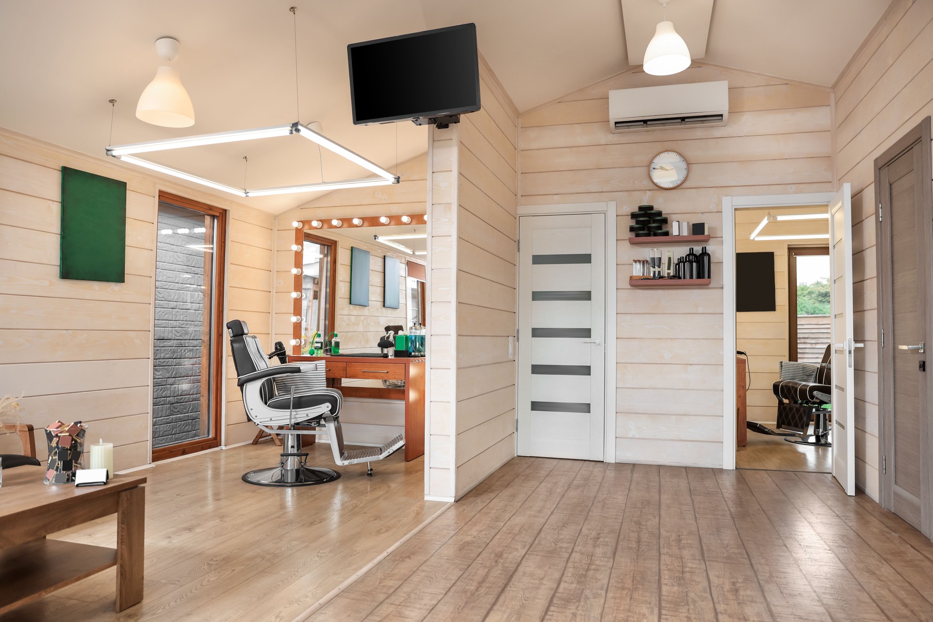 Stylish barbershop interior with professional hairdresser's workplace